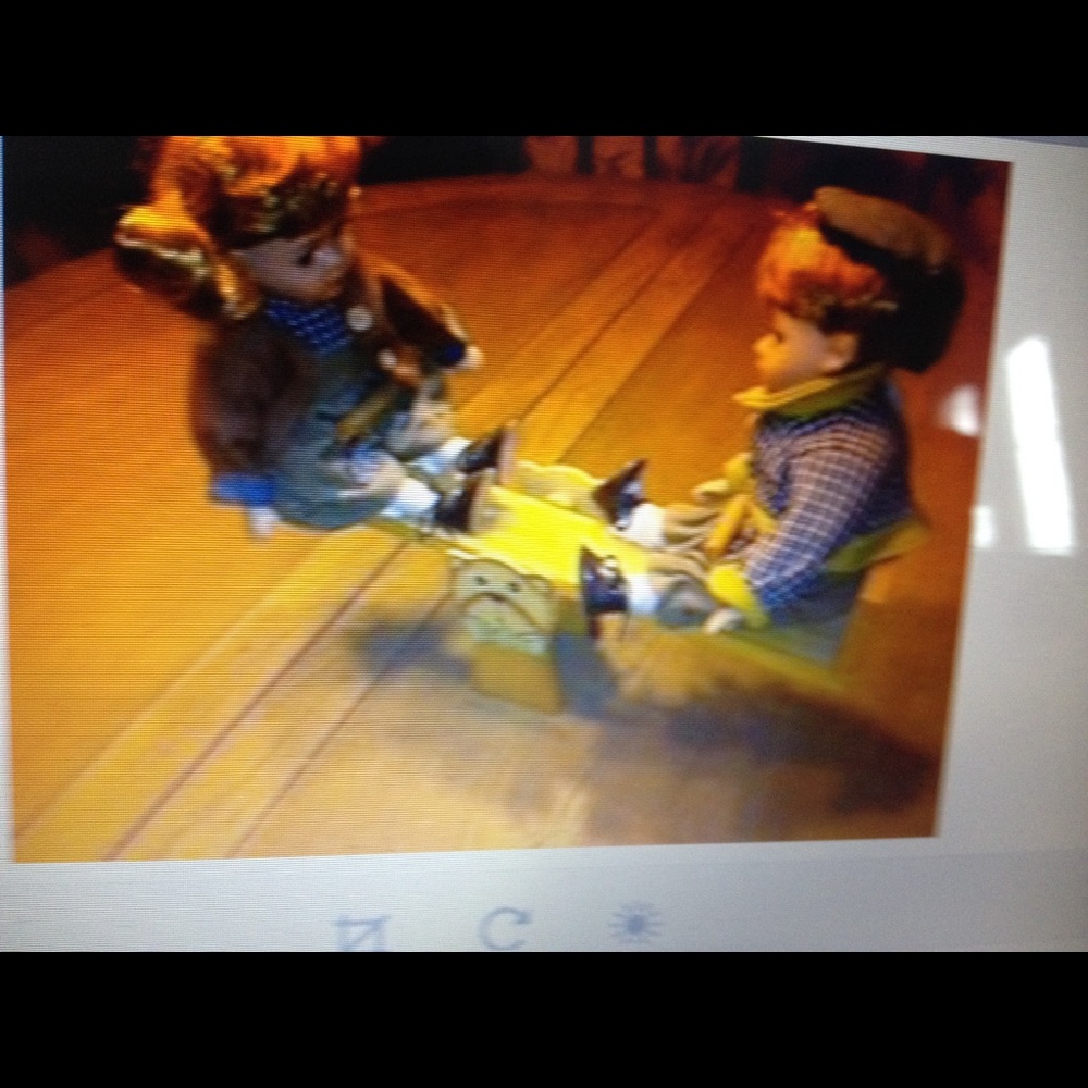 Porcelain Boy and Girl on SeeSaw